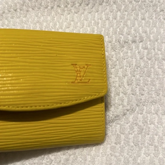 Louis Vuitton yellow coin case